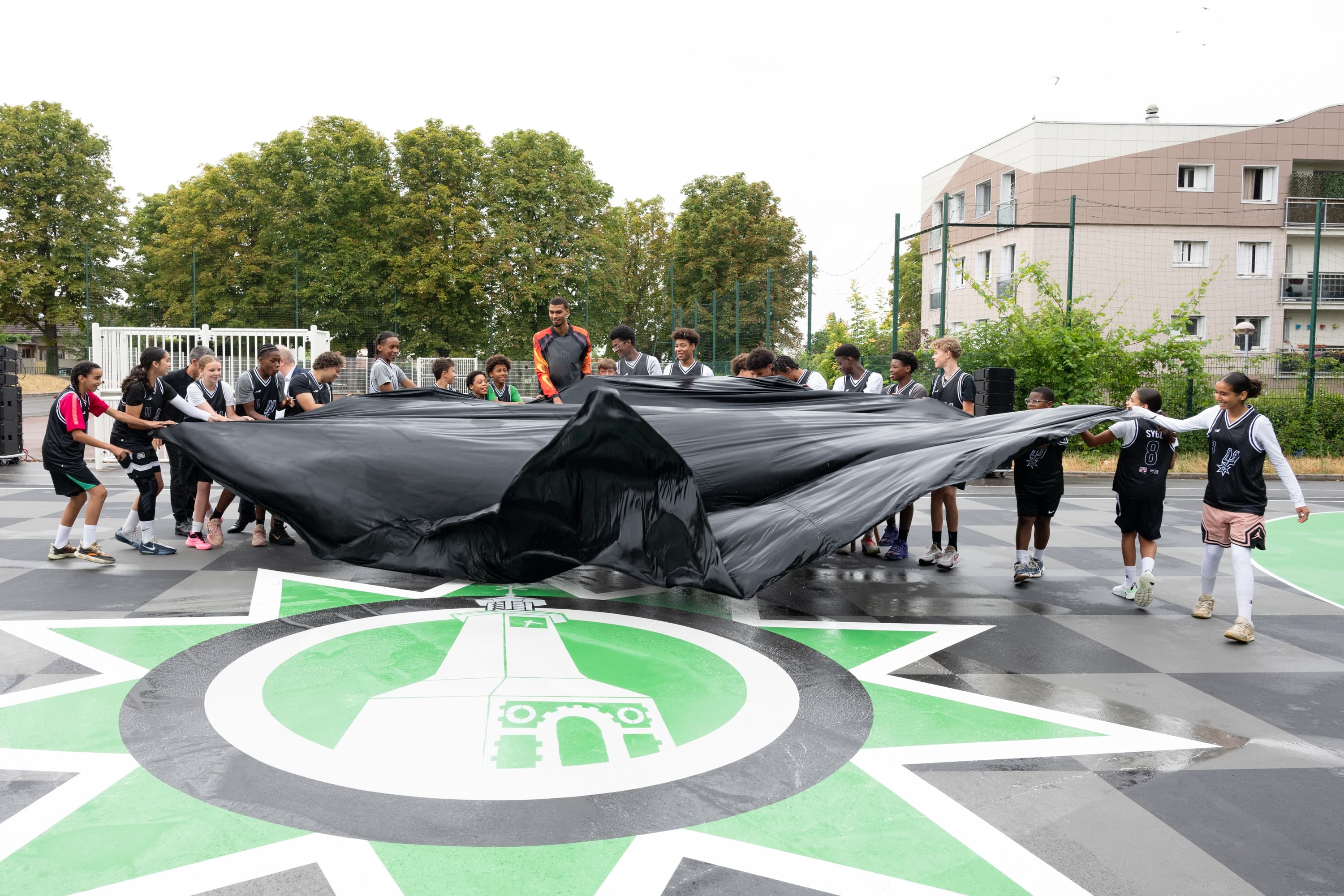 San Antonio Spurs & Ledger Unveil Refurbished Community Basketball Court In Nanterre, France | San Antonio Spurs
